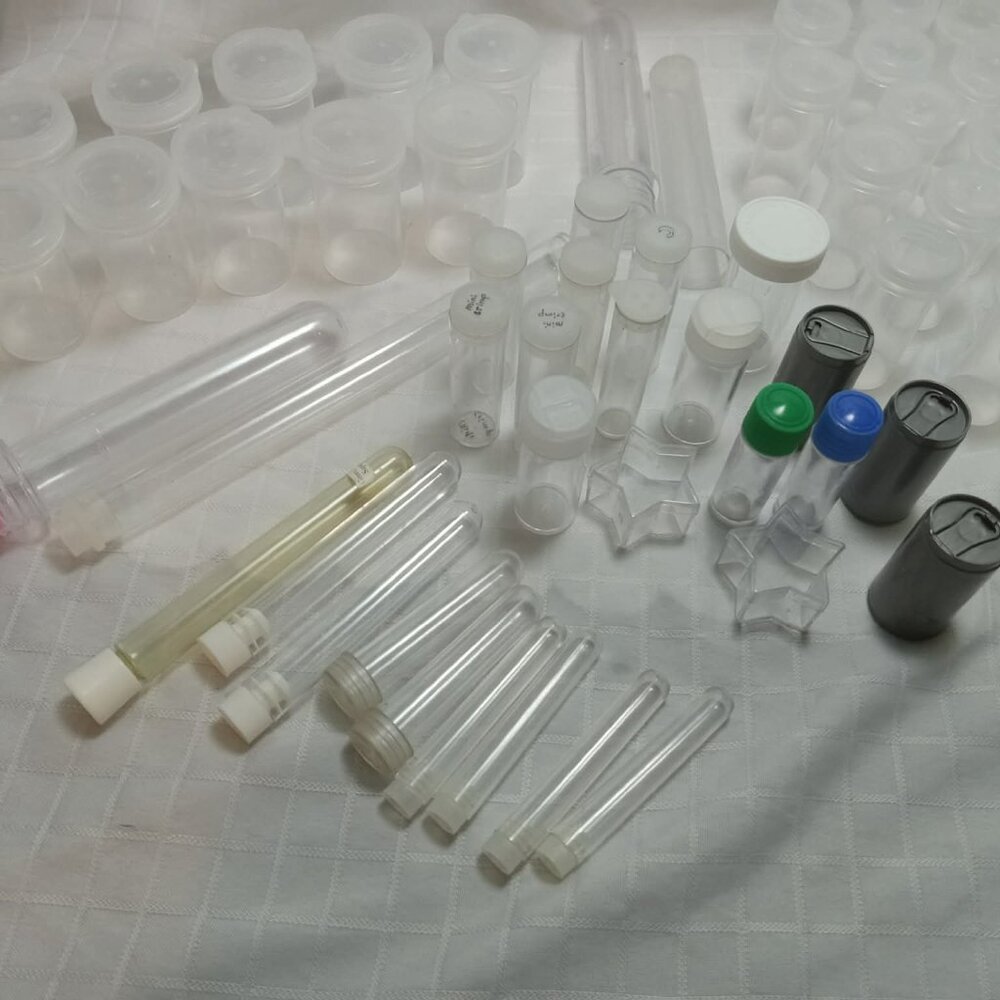 A large number of vintage plastic test tubes, several unique jars for DIY +bonus